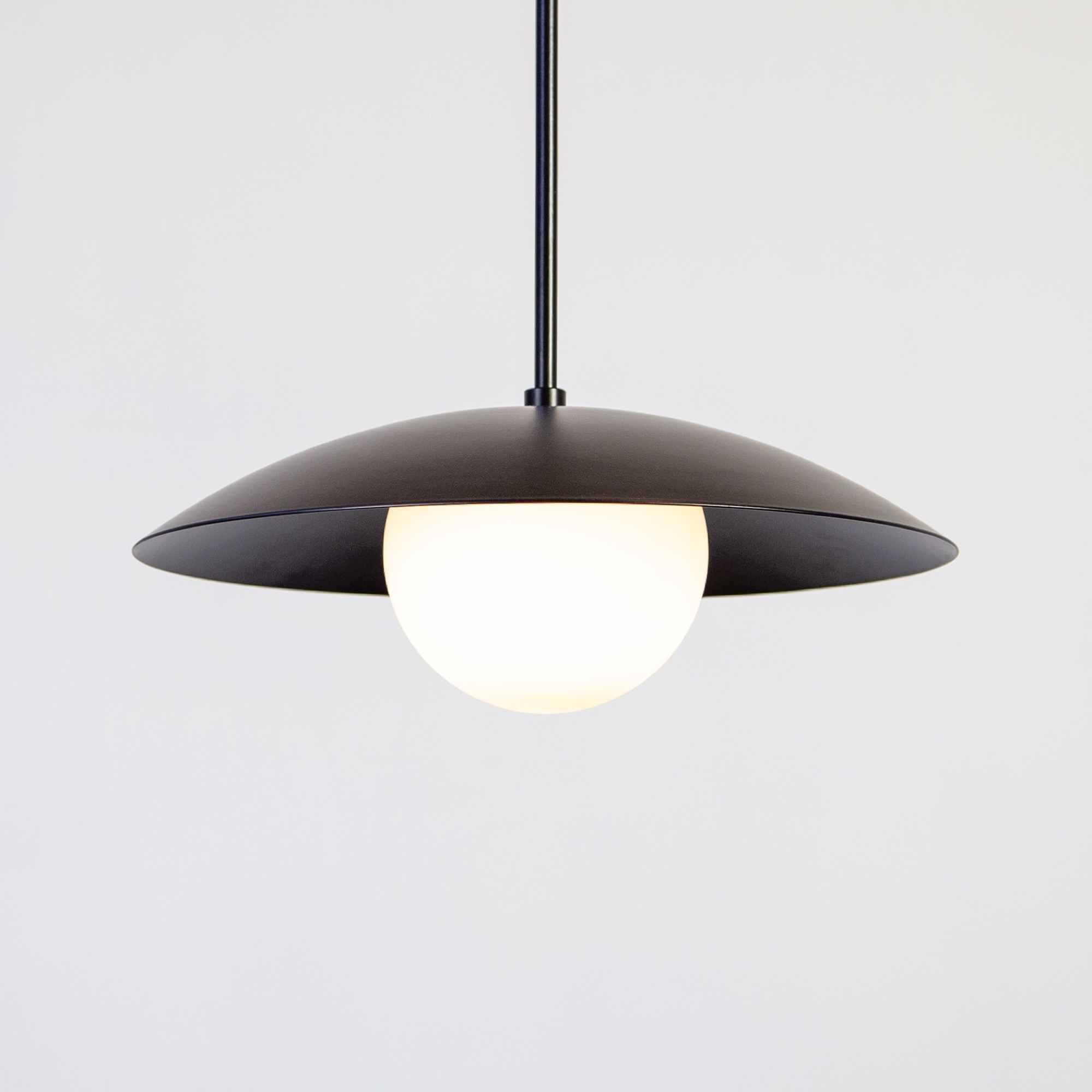 Dome Pendant Light in Black with a glass globe By Research.Lighting